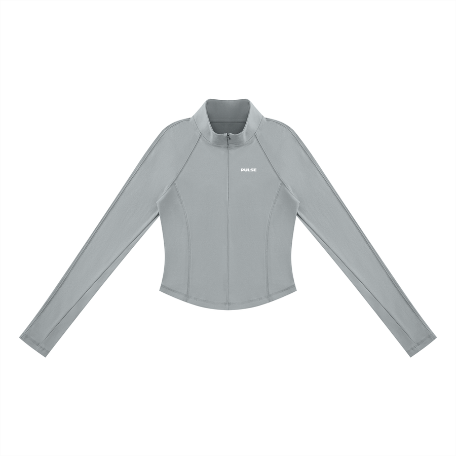 Vorderansicht des PULSE SPECTRE Quarter-Zip Longsleeves für Damen in Grau mit körpernahem Schnitt und langen Raglanärmeln.